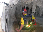 One of the cyclists sliding in the cave