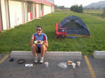 Eating breakfast before the 75 mile ride. Notice how many campers are in the field behind me.
